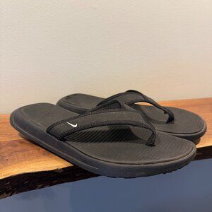 Men's Nike Flip Flops in black, size 8